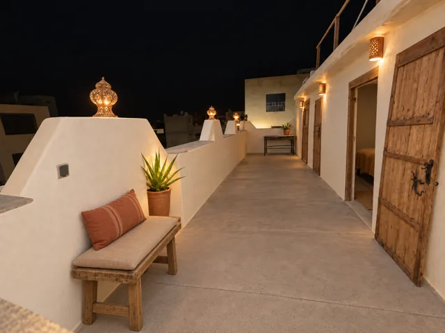 A passage between the seating areas on the rooftop terrace